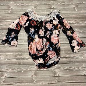 Boutique Style Infant Onsie Flowers on Black Background. 12-28 months